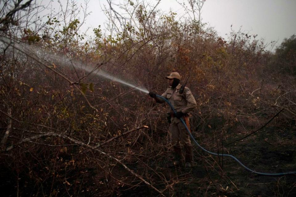 A firefighter tackles one of the fires in the region - getty