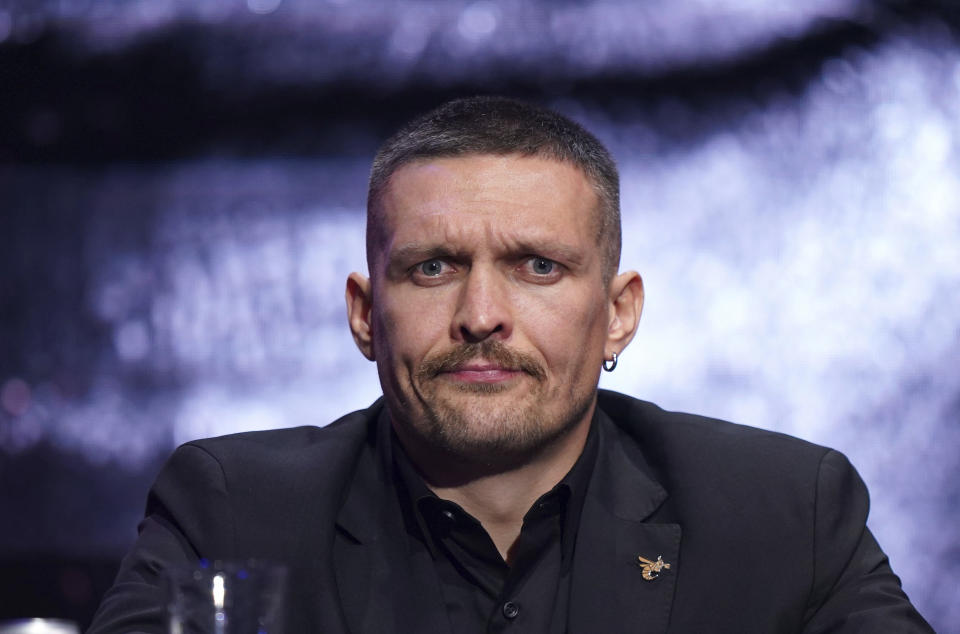 Ukrainian heavyweight boxing champion Oleksandr Usyk looks on during a joint press conference with British WBC and lineal heavyweight champion Tyson Fury, not pictured, at Outernet London, Thursday Nov. 16, 2023. (Zac Goodwin/PA via AP)