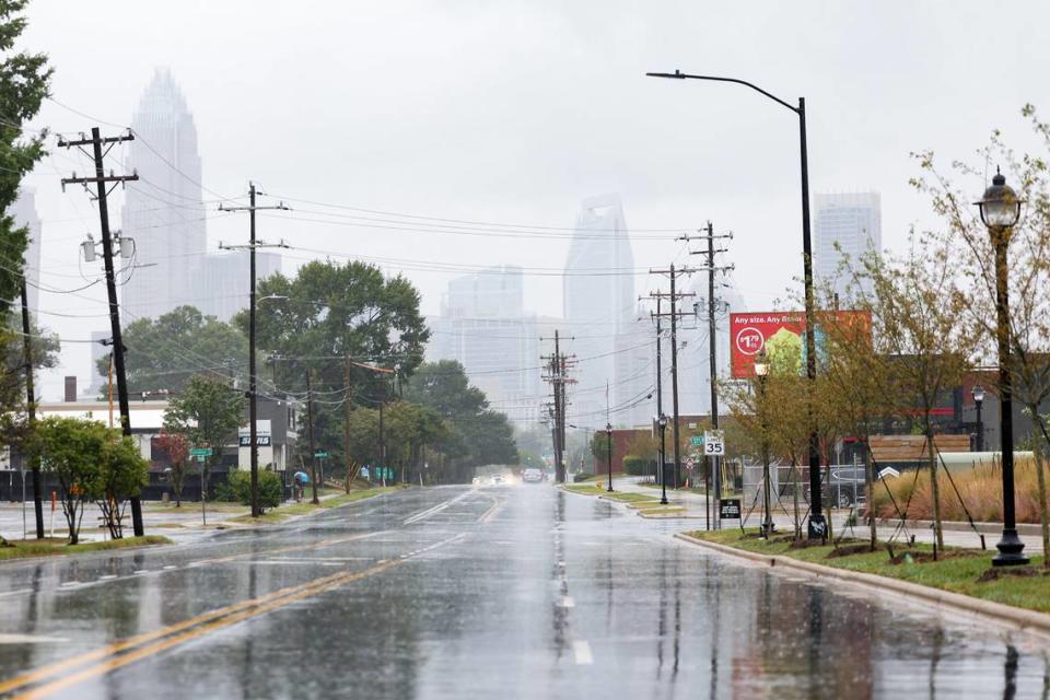 North Graham Street is uncharacteristically quiet on a Friday morning as rain falls as a result of storm fronts from Hurricane Ian on Friday, September 30, 2022 in Charlotte, NC.