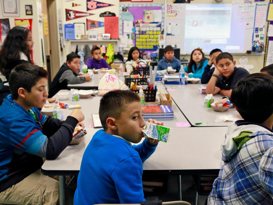 Students eating breakfast in class in 2015