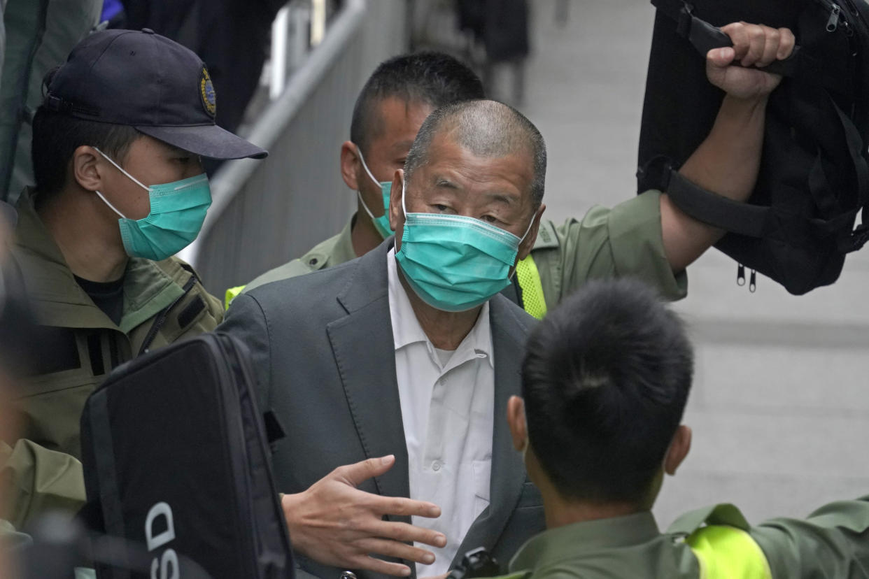 Democracy advocate Jimmy Lai leaves the Hong Kong's Court of Final Appeal, Tuesday, Feb. 9, 2021. The court on Tuesday denied bail for government critic and newspaper publisher Lai who is facing charges under a sweeping new national security law. (AP Photo/Kin Cheung)