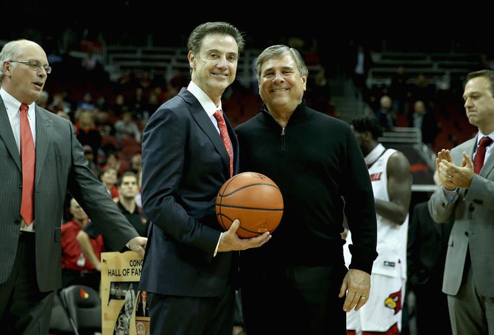 A few years after Rick Pitino celebrated his 700th career win with athletic director Tom Jurich, both are out at Louisville. (Getty)