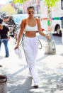 <p>Hadid stripped down during a summer day in New York City and finished off some errands with her white tee in hand. (Photo: Getty Images) </p>