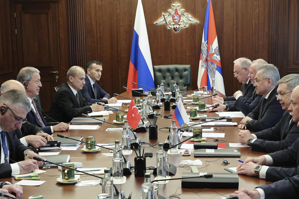 In this handout photo released by Russian Defense Ministry Press Service on Tuesday, April 25, 2023, Russian Defense Minister Sergei Shoigu, third right, and Turkish Defense Minister Hulusi Akar, third left, attend the talks in Moscow, Russia. Defense ministers from Russia, Iran, Syria and Turkey attend talks in Moscow on Tuesday. The talks are part of the Kremlin's efforts to help broker a rapprochement between the Turkish and Syrian governments. (Russian Defense Ministry Press Service via AP)