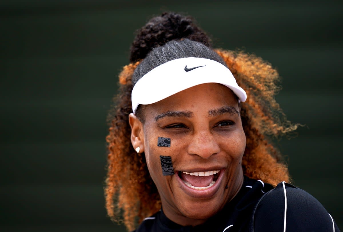 Serena Williams laughs during training at Wimbledon (John Walton/PA) (PA Wire)