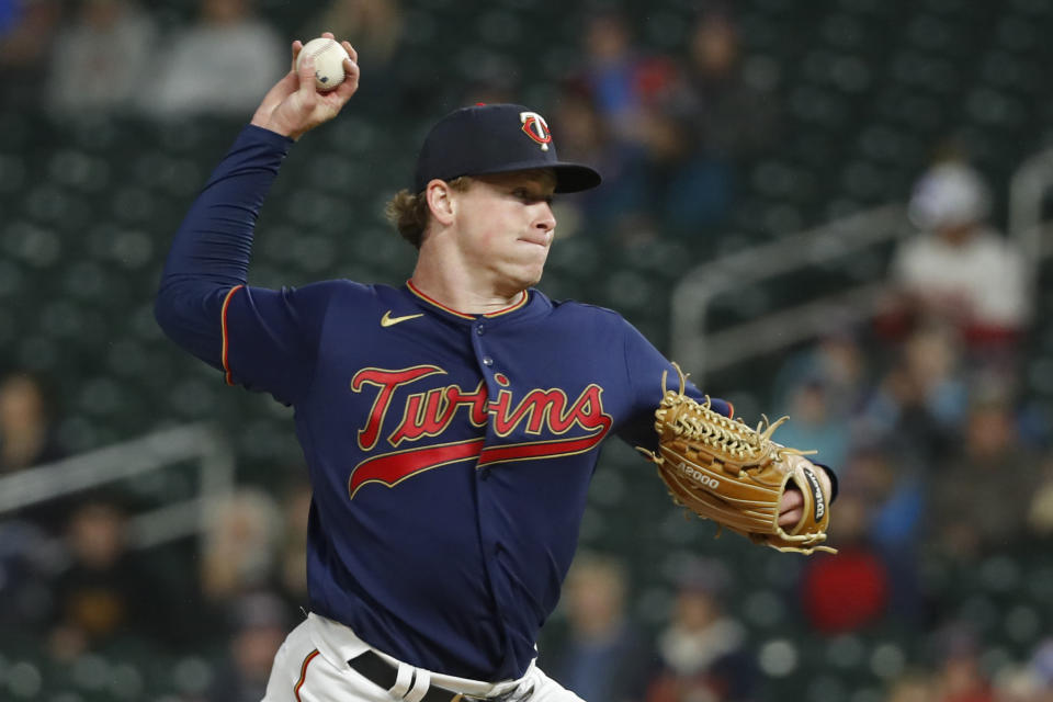 Minnesota Twins starting pitcher Louie Varland throws to a Los Angeles Angels batter during the first inning of a baseball game Friday, Sept. 23, 2022, in Minneapolis. (AP Photo/Bruce Kluckhohn)