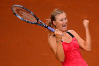 STUTTGART, GERMANY - APRIL 29: Maria Sharapova of Russia celebrates after winning her final match against Victoria Azarenka of Belarus during day seven of the WTA Porsche Tennis Grand Prix at Porsche Arena on April 29, 2012 in Stuttgart, Germany. (Photo by Dennis Grombkowski/Bongarts/Getty Images) *** BESTPIX ***