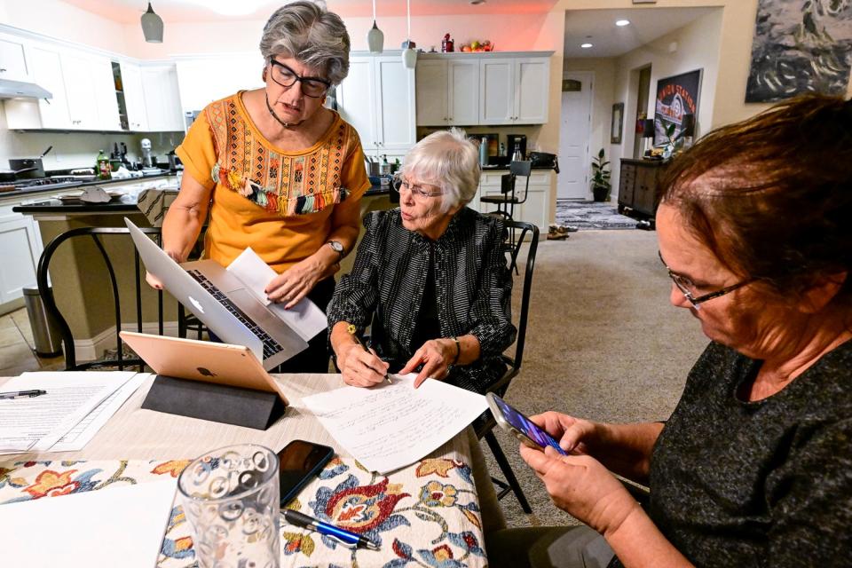 League of Women Voters of Tulare County members Maile Melkonian, left, Sherri Bentley and Donna Kindschuh work behind the scenes Wednesday, October 5, 2022 to produce the virtual Visalia City Council forum.