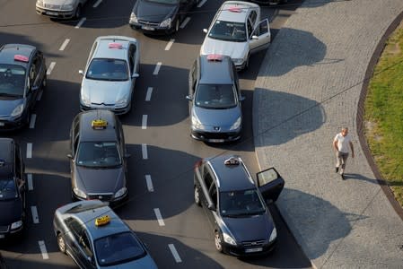 Taxi drivers block traffic during a protest in Belgrade