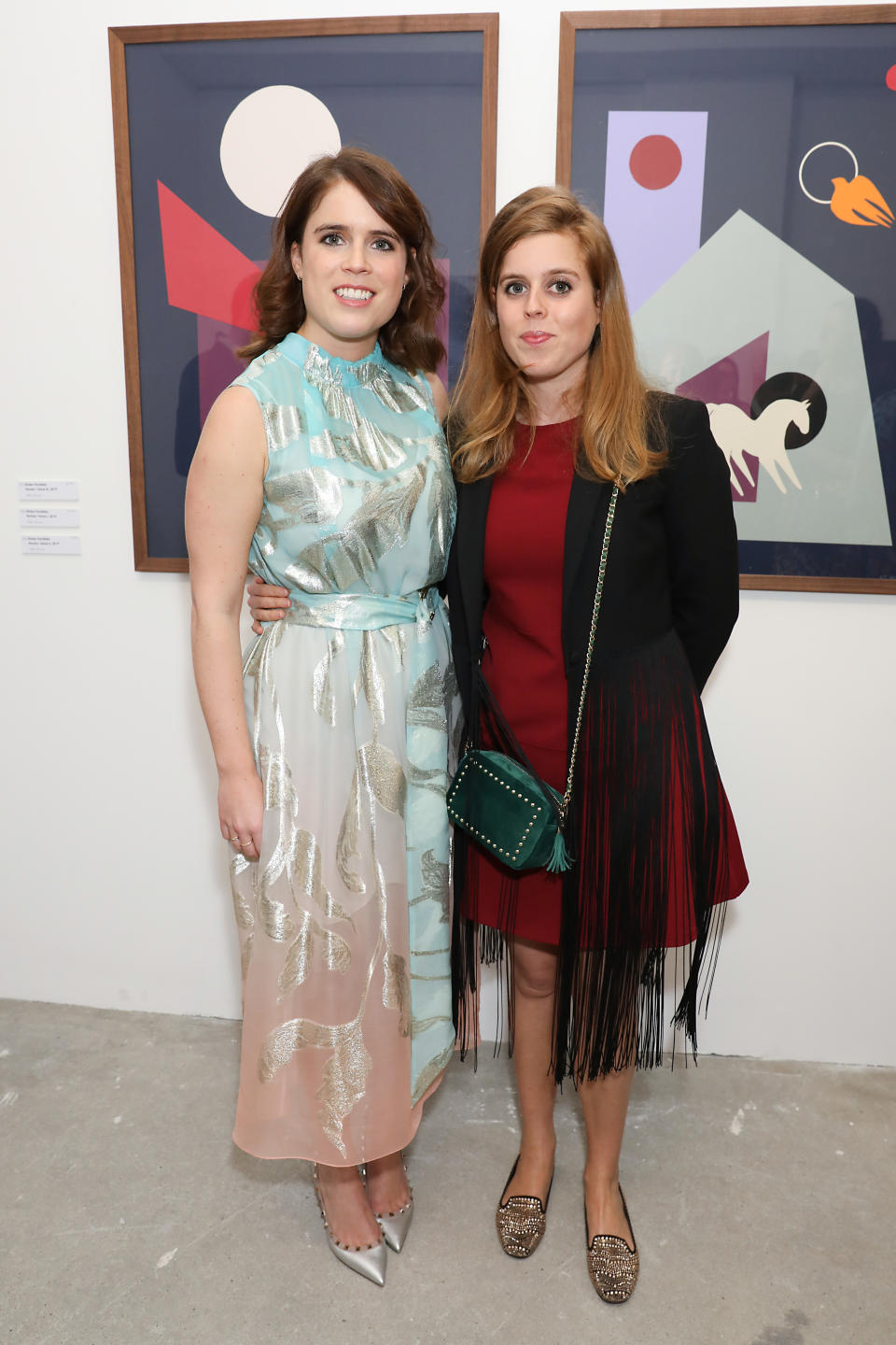 It was a royal affair in London, as Princess Beatrice and Eugenie attended the Animal Ball art show. For the outing, Eugenie wore wedding dress designer Peter Pilotto while sister Beatrice oped for a fringed jacket and burgundy shift dress. [Photo: Getty]