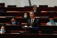 Hong Kong Financial Secretary Paul Chan delivers the annual budget at the Legislative Council in Hong Kong