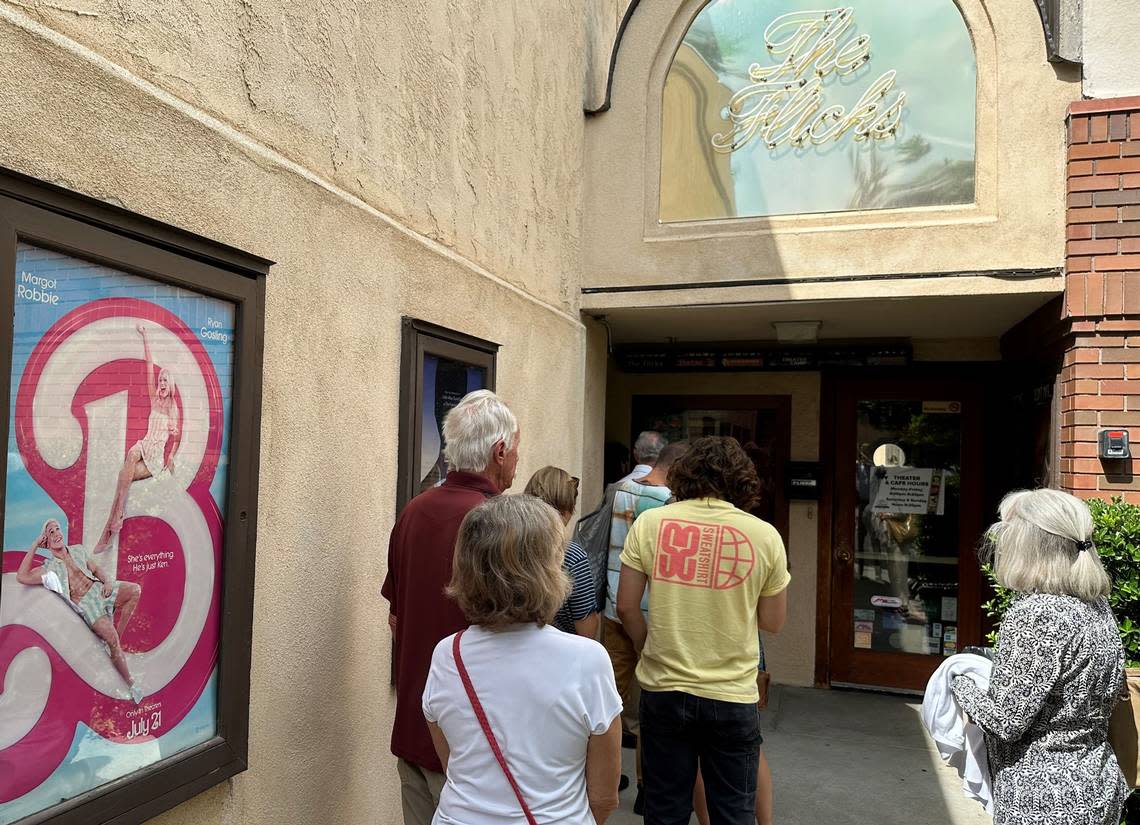 Customers line up Tuesday at The Flicks movie theater in Boise. The Flicks has gotten a bump from the success of “Barbie” as well as the “Barbenheimer” phenomenon of watching “Barbie” and “Oppenheimer” back to back.