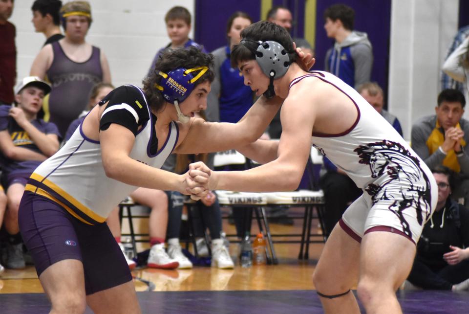 Bronson's Matthew Blankenship and Union City's Hunter Gillies jockey for position early in their battle at 285 pounds Wednesday night. Blankenship went on to take the 2-0 decision win