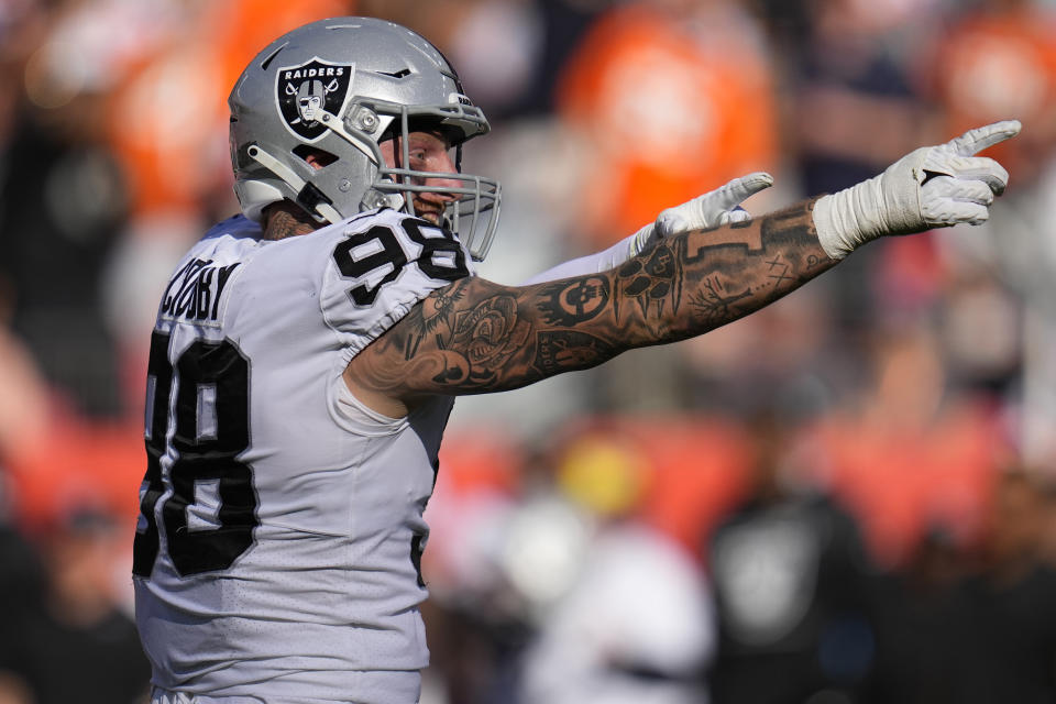 Las Vegas Raiders defensive end Maxx Crosby (98) against the Denver Broncos during the first half of an NFL football game, Sunday, Oct. 17, 2021, in Denver. (AP Photo/Jack Dempsey)