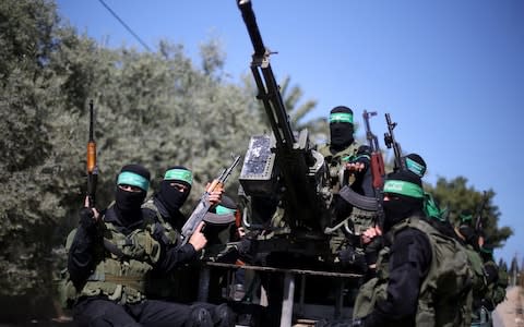Ex-Israeli officials have warned that instability could benefit Hamas and other militant groups - Credit: REUTERS/Ibraheem Abu Mustafa