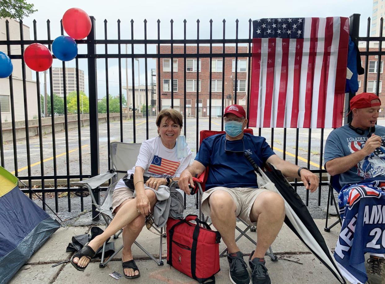 Mary and Ken Legan sit in line for President Donald Trump's Saturday rally in Tulsa, Okla. (Lauren Egan / NBC News)