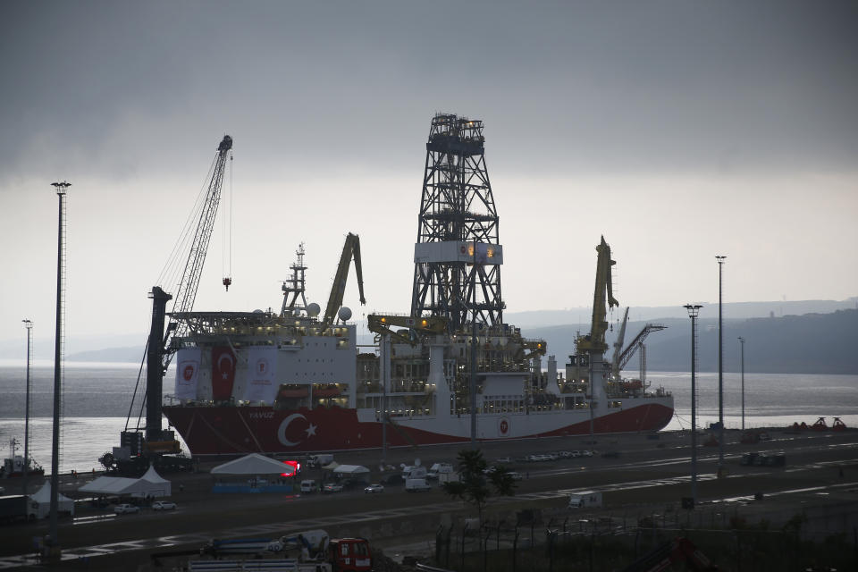 A view of the drilling ship 'Yavuz' scheduled to be dispatched to the Mediterranean, at the port of Dilovasi, outside Istanbul, Thursday, June 20, 2019. Turkish officials say the drillship Yavuz will be dispatched to an area off Cyprus to drill for gas. Another drillship, the Fatih, is now drilling off Cyprus' west coast at a distance of approximately 40 miles in waters where the east Mediterranean island nation has exclusive economic rights. The Cyprus government says Turkey's actions contravene international law and violate Cypriot sovereign rights. (AP Photo/Lefteris Pitarakis)