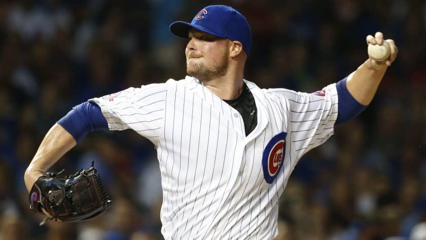 FILE - In this Sept. 25, 2016, file photo, Chicago Cubs starter Jon Lester throws against the St. Louis Cardinals during the first inning of a baseball game in Chicago. Kris Bryant is back. Same for Anthony Rizzo and Jon Lester, too. Even 1908 is back in the picture. That was the last time the Chicago Cubs won the World Series before Bryant and company ended the drought last November. (AP Photo/Nam Y. Huh, File)