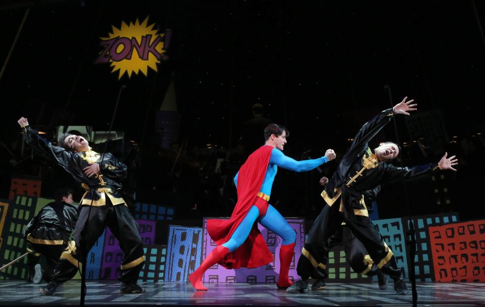 This undated image released by Helene Davis Public Relations shows Edward Watts as Superman, center, in Encore's "It's A Bird It's A Plane It's Superman," performing through March 24 at New York City Center in New York. (AP Photo/Helene Davis Public Relations, Joan Marcus)