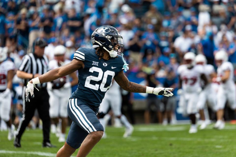 Brigham Young Cougars running back Deion Smith (20) celebrates his touchdown at the end of the first half at LaVell Edwards Stadium in Provo on Saturday, Sept. 9, 2023. | Megan Nielsen, Deseret News