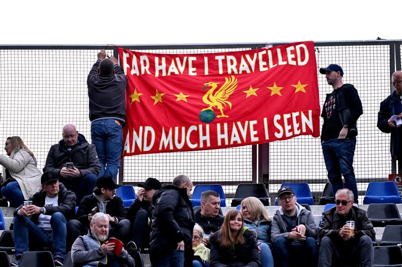 Liverpool fans hanging a banner before the UEFA Europa League 2023/24 Quarter-Final second leg match between Atalanta and Liverpool FC at Stadio Atleti Azzurri d'Italia on April 18, 2024 -Credit:Photo by Andrew Powell/Liverpool FC via Getty Images