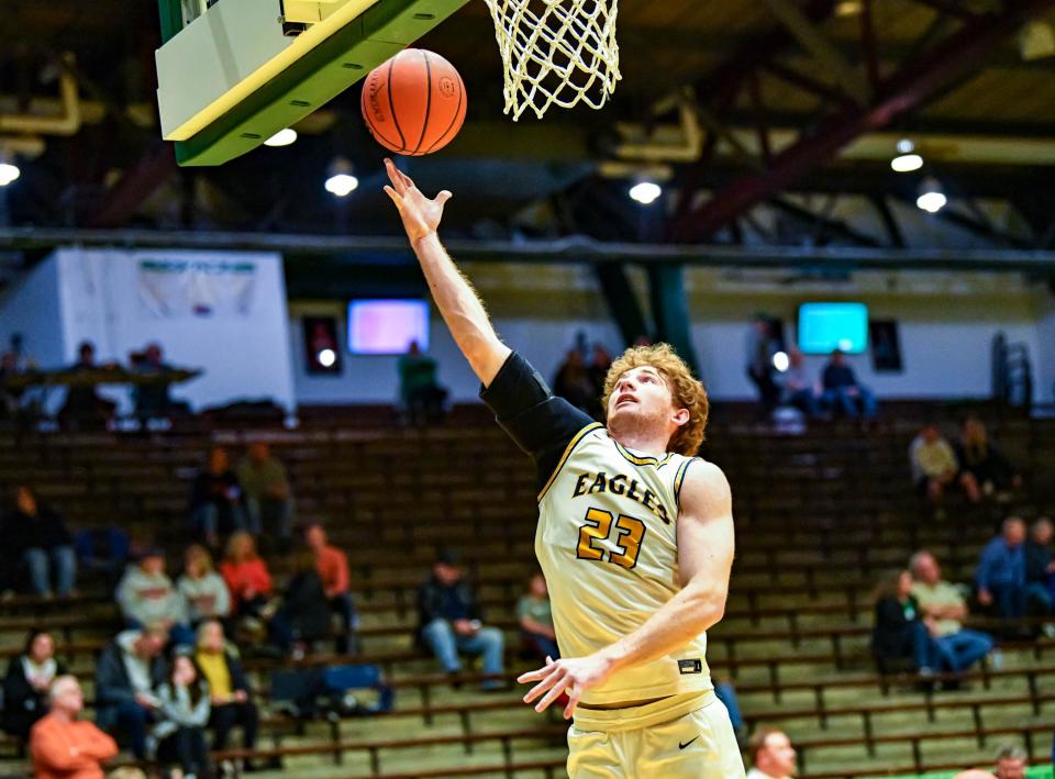 Delta boys basketball's Jackson Wors makes a layup in his team's sectional semifinal victory over Hamilton Heights at the New Castle Fieldhouse on Friday, March 3, 2023.