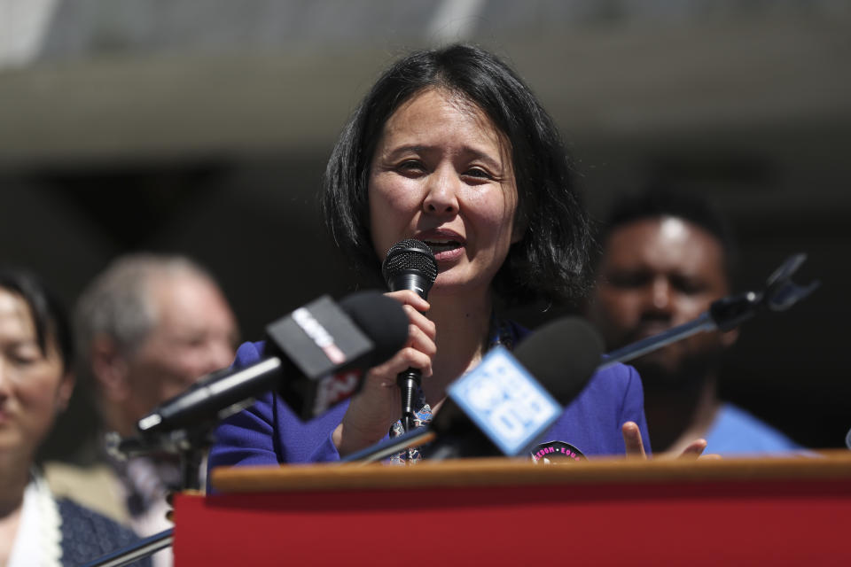 Democratic Rep. Khanh Pham answers questions during a news conference and rally against the Republican Senate walkout at the Oregon State Capitol in Salem, Ore., Tuesday, June 6, 2023. (AP Photo/Amanda Loman)