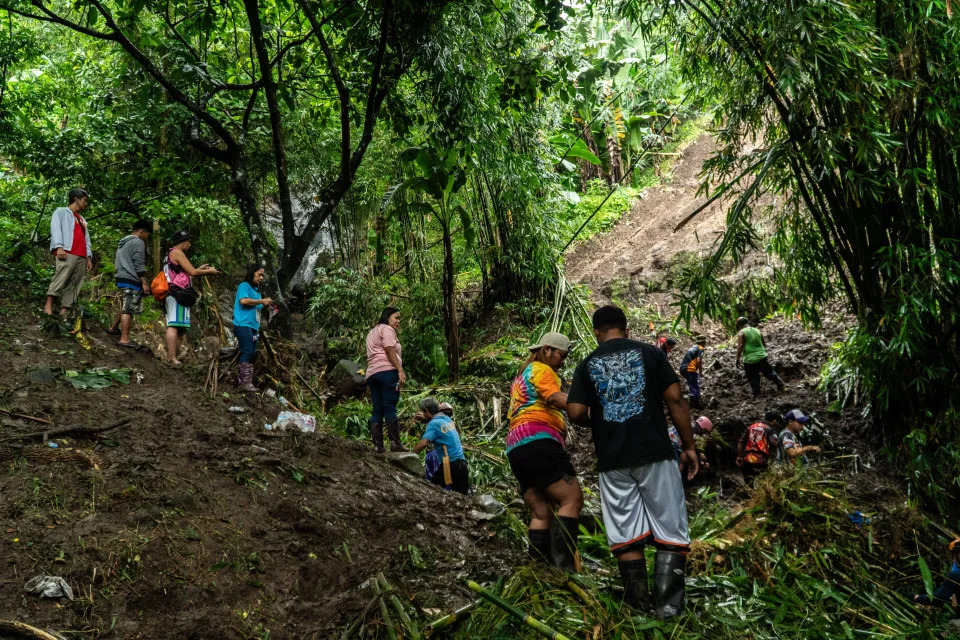 Search and rescue operations continue in Antipolo, Rizal, at the site where people may be buried following a landslide triggered by Tropical Storm Yagi (Anadolu via Getty Images)