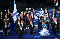 LONDON, ENGLAND - AUGUST 29: Shooter Doron Shaziri of Israel carry the flag during the Opening Ceremony of the London 2012 Paralympics at the Olympic Stadium on August 29, 2012 in London, England. (Photo by Gareth Copley/Getty Images)