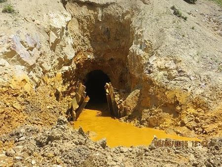 Yellow mine waste water is seen at the entrance to the Gold King Mine in San Juan County, Colorado, in this picture released by the Environmental Protection Agency (EPA) taken August 5, 2015. REUTERS/EPA/Handout