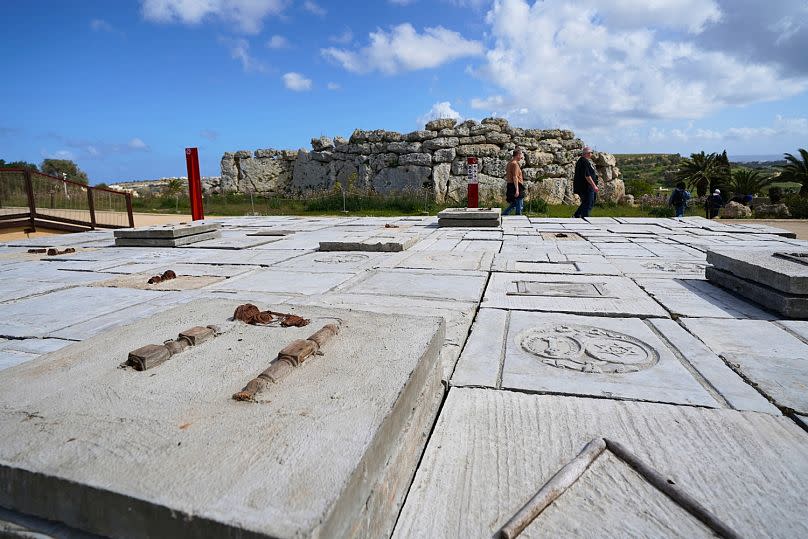 Ghanaian artist Ibrahim Mahama’s “Garden of Scars,” a collection of concrete slabs and casts of tombstones that examine the histories of Ghana and the Netherlands.