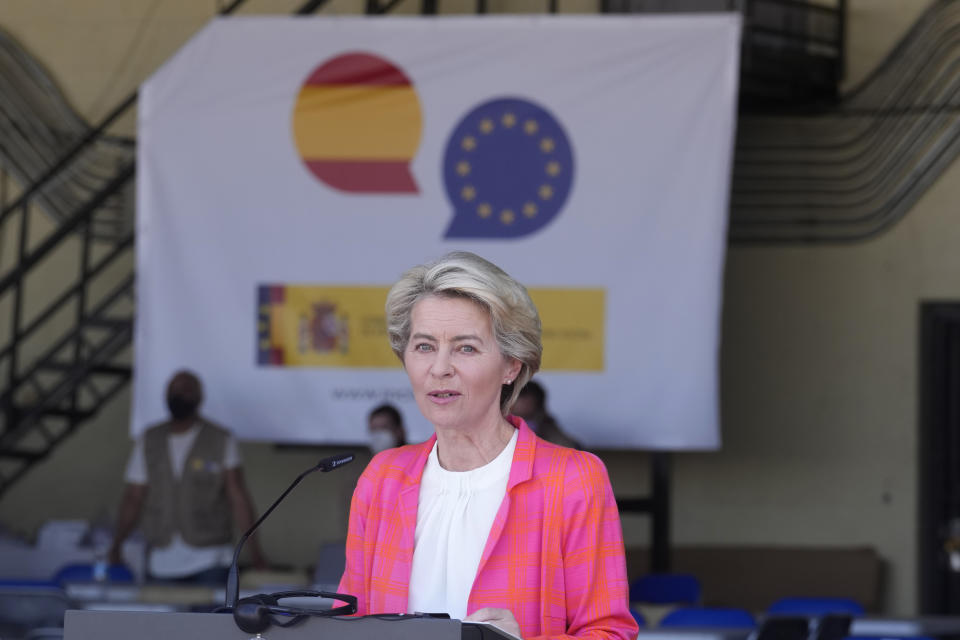 EU Commission president Ursula von der Leyen speaks during a news conference at the Torrejon military airbase in Madrid, Spain, Saturday, Aug. 21, 2021. Top European Union officials visited a Spanish military airport being used as a hub to receive Afghans flown out of Kabul before they are distributed to other countries in the bloc. (AP Photo/Paul White)