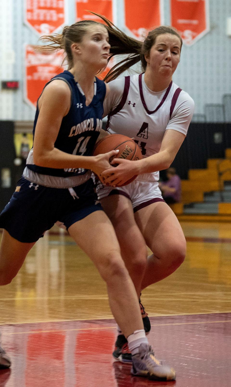 Council Rock South's Kathryn O'Kane (14) against Abington's Piper McGinley (11) during their girls basketball game in the Jim Church Classic at Souderton High School in Souderton on Friday, Dec. 1, 2023

[Daniella Heminghaus | Bucks County Courier Times]