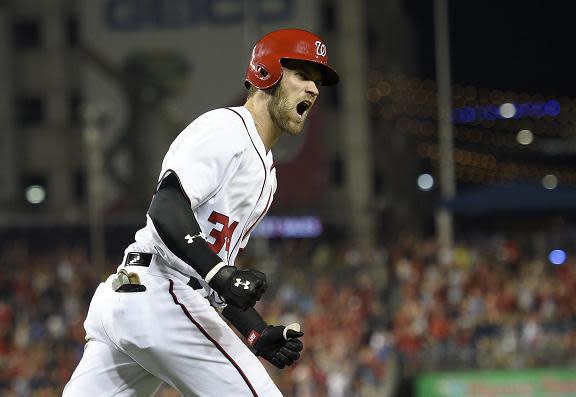 Bryce Harper reacts after hitting a three-run home run in the Nationals 3-0 win against the Phillies. (AP)