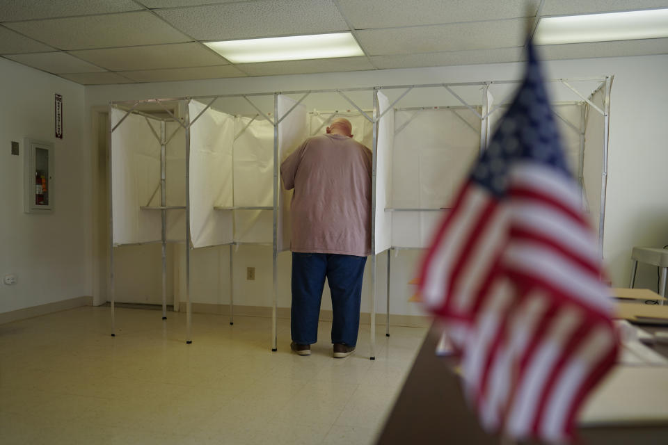 FILE - A voter fills out a ballot during the Pennsylvania primary election at the Michaux Manor Living Center in Fayetteville, Pa., May 17, 2022. As the 2022 midterm elections enter their final two-month sprint, leading Republicans concede that their party's advantage may be slipping even as Democrats confront their president's weak standing, deep voter pessimism and the weight of history this fall. (AP Photo/ Carolyn Kaster, File)