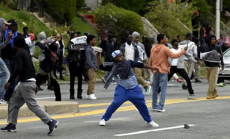 Protesters clash with police near Mondawmin Mall after Freddie Gray's funeral in Baltimore April 27, 2015.REUTERS/Sait Serkan Gurbuz