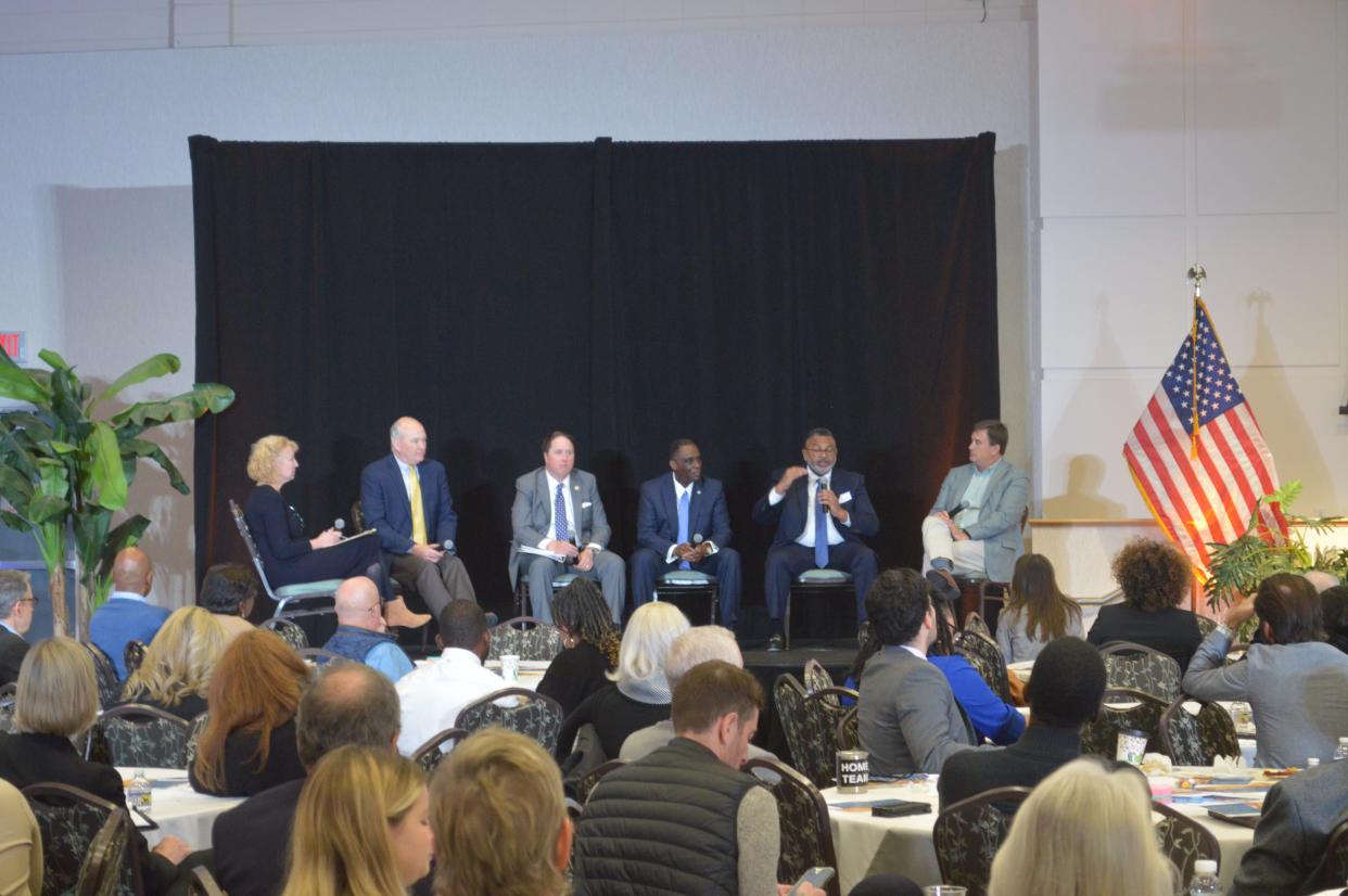 (L TO R: Moderator Cindy Kelley, Georgia Department of Community Affairs Commissioner Christopher Nunn, Savannah City Manager Jay Melder, Chatham County Manager Michael Kaigler, Savannah Housing Authority Deputy Director Kenneth Clark, and Savannah Area Chamber of Commerce President Bert Brantley)