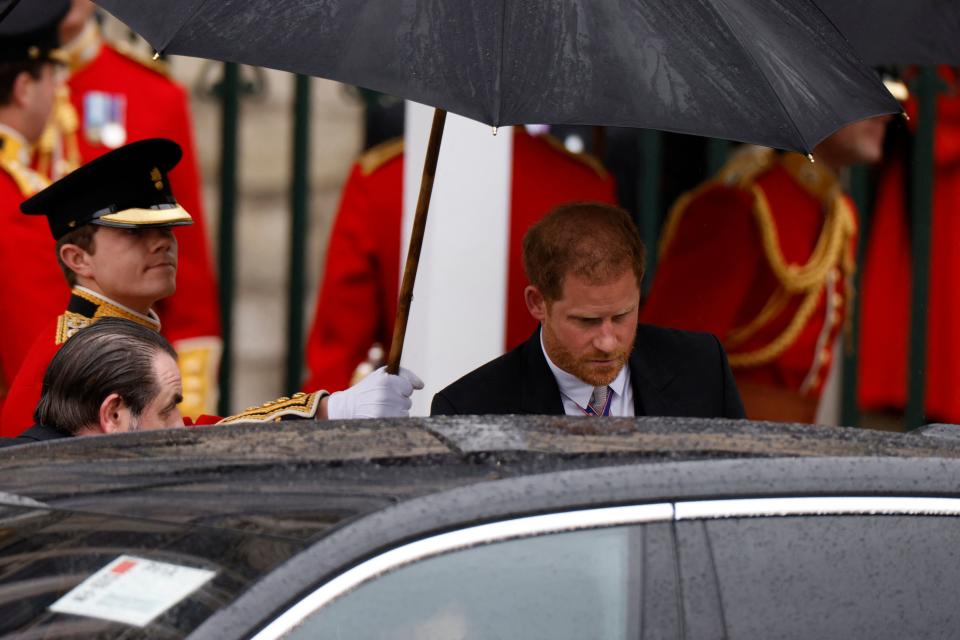 Britain's Prince Harry, Duke of Sussex leaves Westminster Abbey after the Coronation Ceremonies of Britain's King Charles III and Britain's Queen Camilla in central London on May 6, 2023. - The set-piece coronation is the first in Britain in 70 years, and only the second in history to be televised. Charles will be the 40th reigning monarch to be crowned at the central London church since King William I in 1066. Outside the UK, he is also king of 14 other Commonwealth countries, including Australia, Canada and New Zealand. (Photo by Odd ANDERSEN / AFP) (Photo by ODD ANDERSEN/AFP via Getty Images)