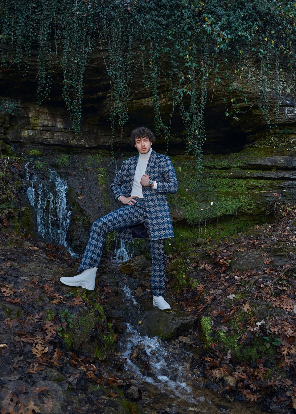 <cite class="credit">Suit, $1,850, by Grayscale / Turtleneck, $590, by Thom Browne / Boots, $515, by Raf Simons / Watch (throughout), his own, by Rolex / Ring (throughout), his own</cite>