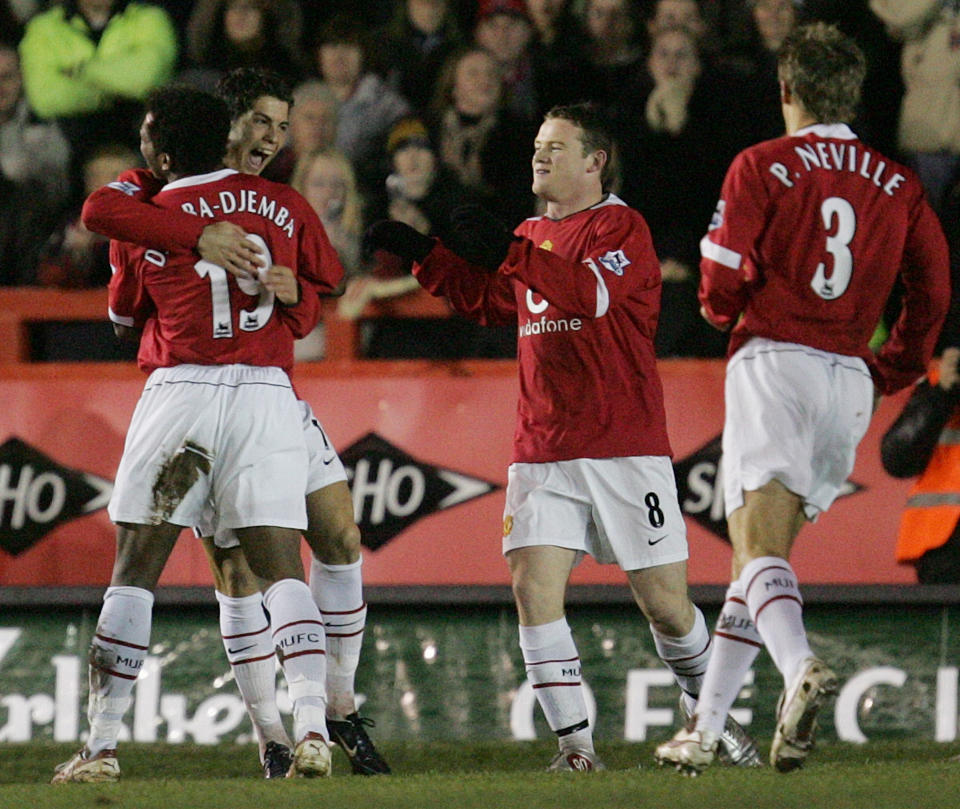 Manchester United’s Cristiano Ronaldo, second left, is congratulated by team mate Eric Djemba-Djemba after scoring against Exeter during their FA Cup third round replay soccer match at Exeter’s St James’ Park ground in Exeter, England, Wednesday, Jan. 19, 2005. (AP Photo/Alastair Grant)