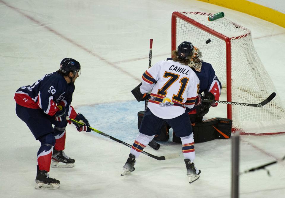 Peoria’s Cayden Cahill (71) shoots past Evansville’s Michael Herringer (33) as the Evansville Thunderbolts host an Education Day game against the Peoria Rivermen at Ford Center in Evansville, Ind., Tuesday, Nov. 14, 2023.