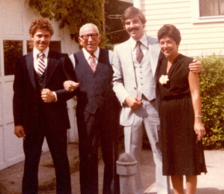 John Walsh, third from left, with his brother, grandfather and mother in Providence in 1982 before attending a cousin’s wedding.