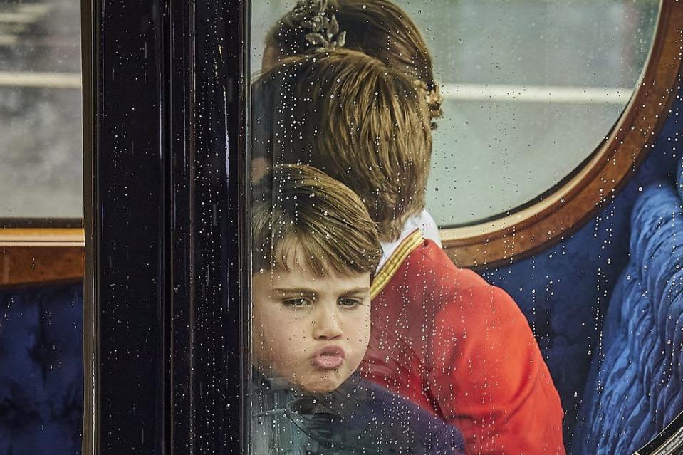 Prince Louis blowing raspberries on the carriage ride to Buckingham Palace
