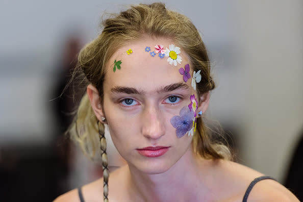 So, now we all want to stick flowers on our face because it just looked too stunning at Preen. 