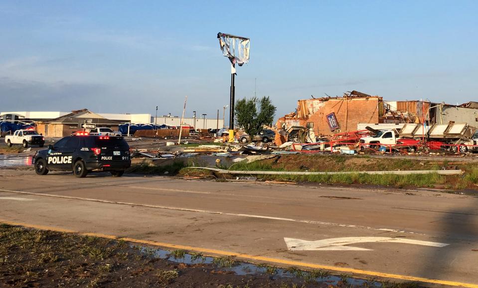 Authorities respond after a deadly storm moved through the area in El Reno, Okla., Sunday, May 26, 2019.