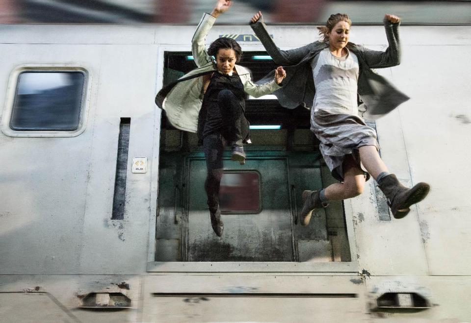 This photo released by Summit Entertainment, LLC shows Zoe Kravitz, left, as Christina and Shailene Woodley as Beatrice "Tris" Prior, in the film, "Divergent." The movie releases Friday, March 21, 2014. (AP Photo/Summit Entertainment, Jaap Buitendijk)