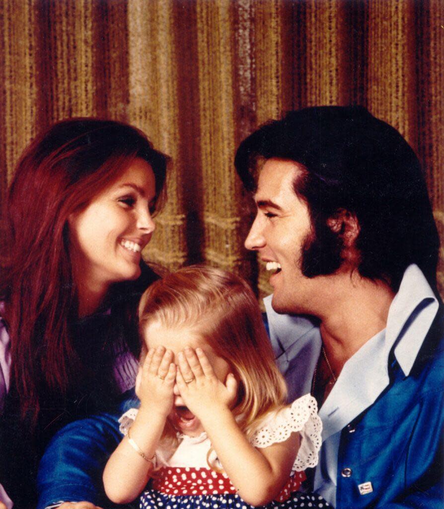 Priscilla Presley, Lisa Marie Presley and Elvis Presley