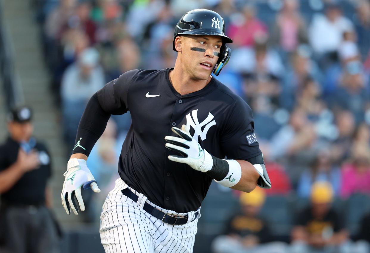 Mar 20, 2024; Tampa, Florida, USA; New York Yankees right fielder Aaron Judge (99) hits a RBI double during the first inning against the Pittsburgh Pirates at George M. Steinbrenner Field. Mandatory Credit: Kim Klement Neitzel-USA TODAY Sports