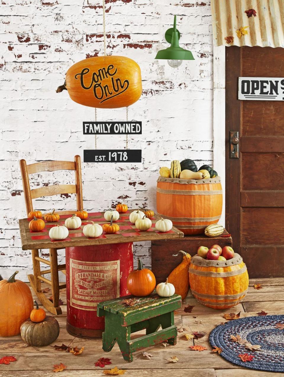 <p>'Tis the season for <a href="https://www.goodhousekeeping.com/home/craft-ideas/how-to/g2257/creative-fall-craft-ideas/" rel="nofollow noopener" target="_blank" data-ylk="slk:rustic fall crafts;elm:context_link;itc:0;sec:content-canvas" class="link ">rustic fall crafts</a> — and this is one that you can reap the benefits of year-round. To make this checkers game, paint a board onto a slab of wood. Then, play checkers using mini gourds of different colors. </p>