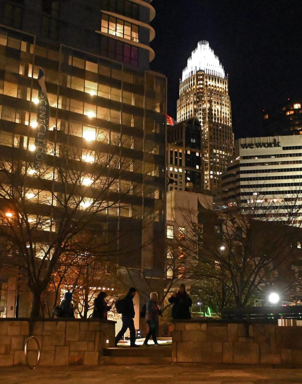 Point-in-Time Count volunteers walk through Romare Bearden Park in uptown Charlotte, NC., on Thursday, January 26, 2023. Volunteers aim to get an accurate statistic of how many people in Charlotte are experiencing homelessness, live in shelters or tents or cars, or otherwise have unstable housing arrangements. JEFF SINER/jsiner@charlotteobserver.com